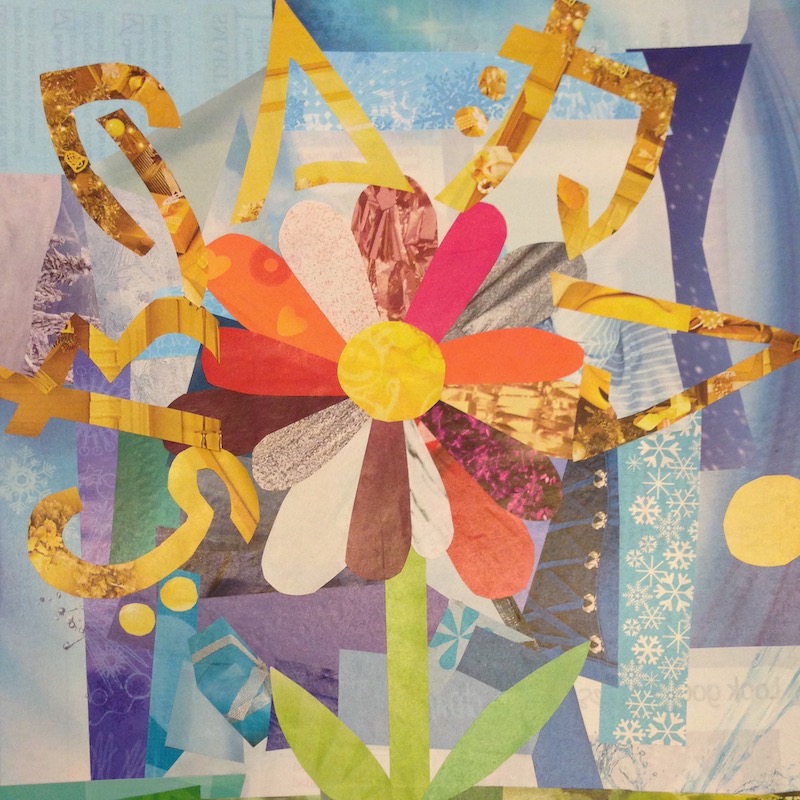 A paper collage with a flower and a writing system I developed for my Gnóma language